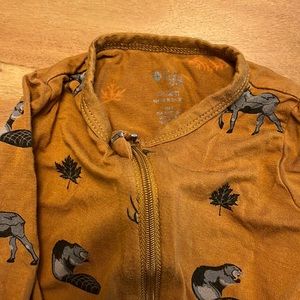 Kyte baby Canadian print zip front footed pajamas. 6-12 month size.